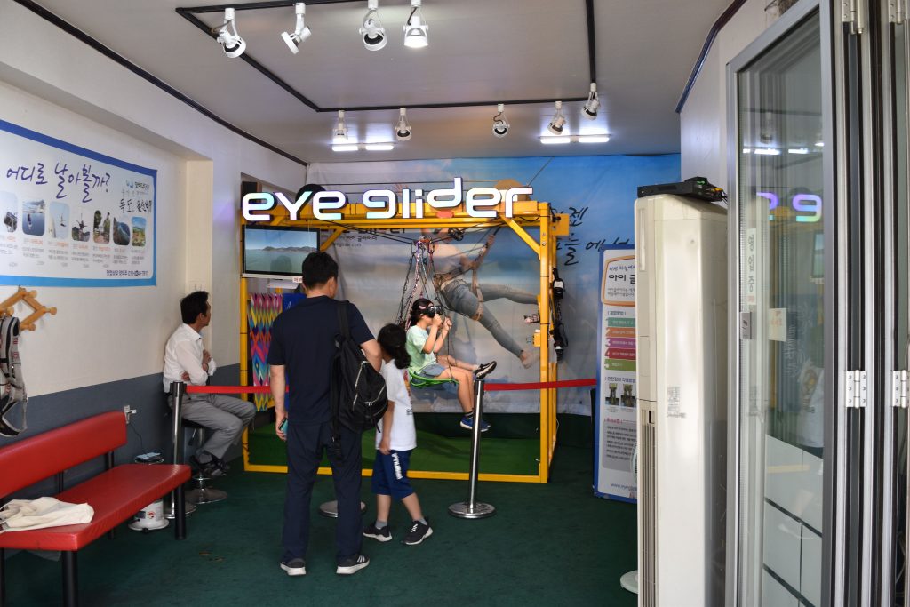 A virtual reality shop in incheon chinatown. Children are playing on the machine